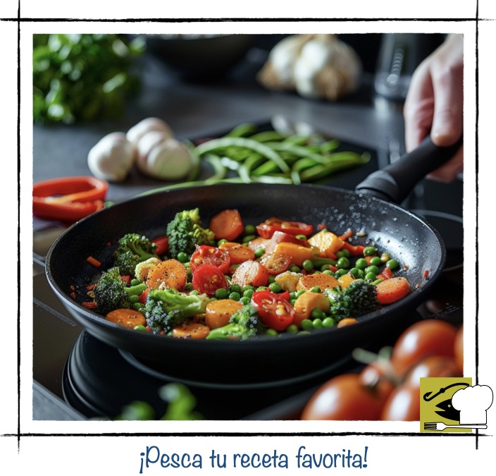 Salteado rápido de verduras en sartén con zanahorias, brócoli y tomates cherry, ideal para preparar guarniciones fáciles y saludables en el día a día.