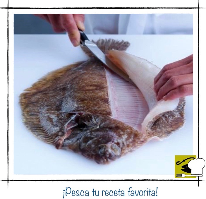 Quinto paso del fileteado: el primer lomo del pescado completamente separado y limpio, junto a la espina central.